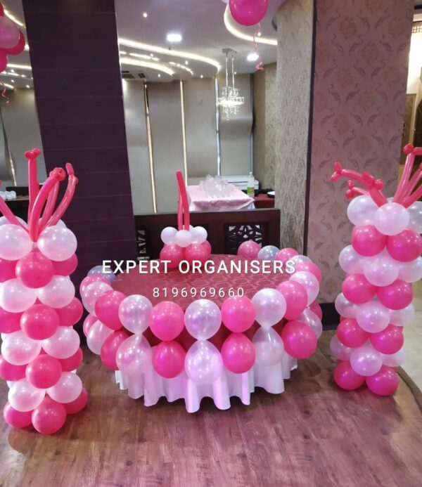 Simple balloon decorations for cake table in hotel near me